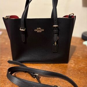 Coach Black Tote with Gold Hardware and Structured Design